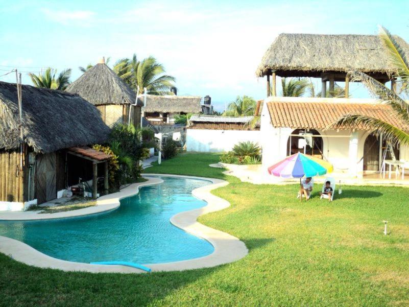 Cabanas Pie De La Cuesta Hotell Coyuca Rum bild