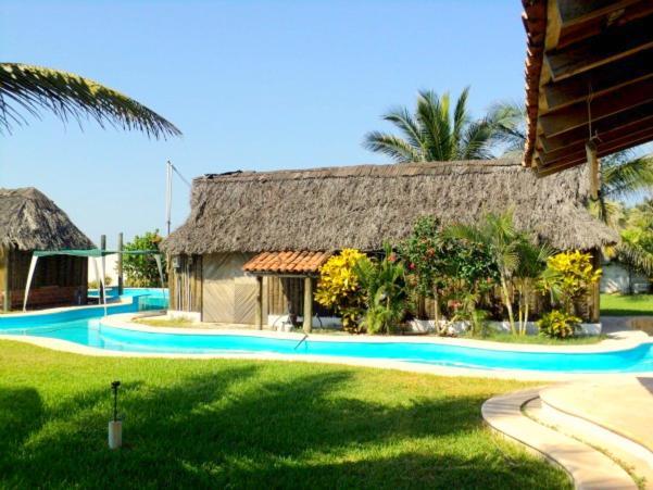 Cabanas Pie De La Cuesta Hotell Coyuca Rum bild
